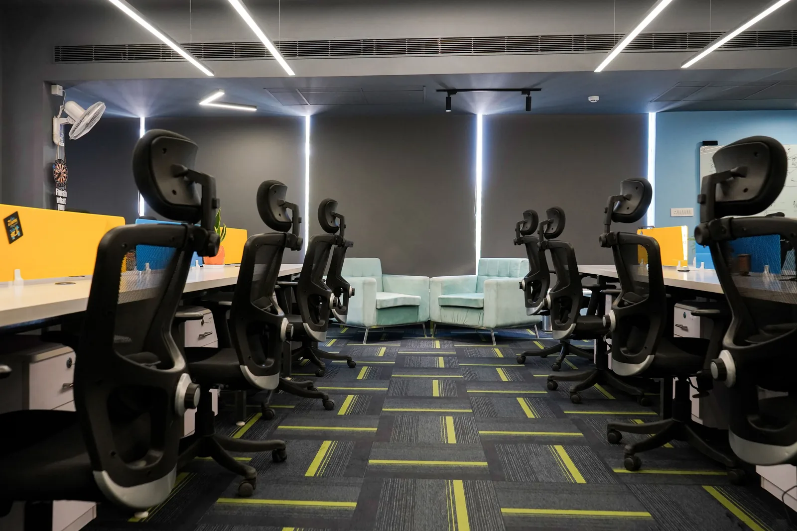 Modern open office with ergonomic chairs