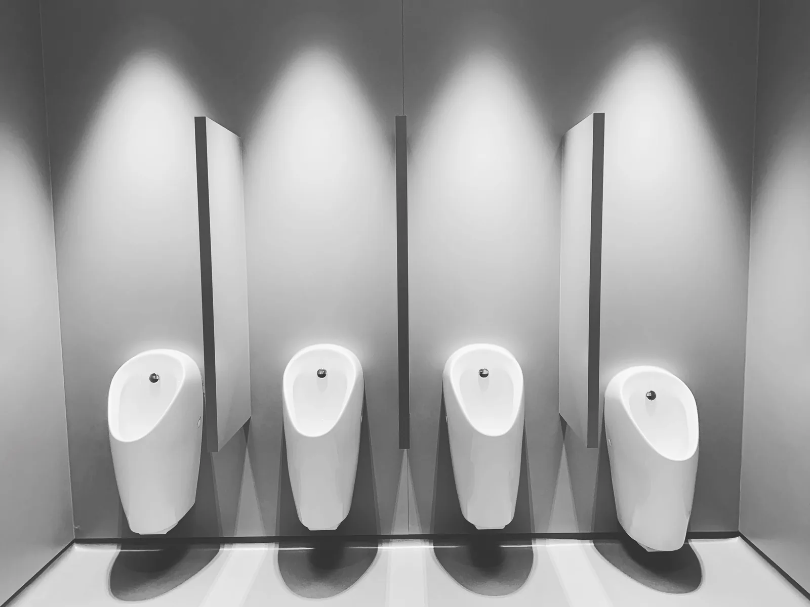 Spotless commercial restroom urinals